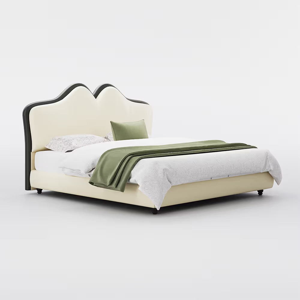 Upholstered bed with curved headboard and leather covering